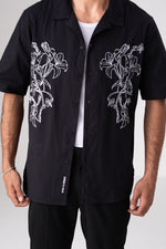 חולצה מכופתרת עם רקמת פרחים