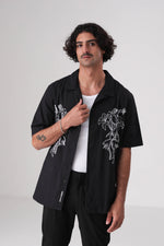 חולצה מכופתרת עם רקמת פרחים