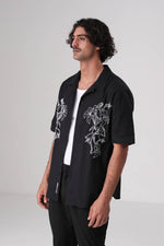 חולצה מכופתרת עם רקמת פרחים