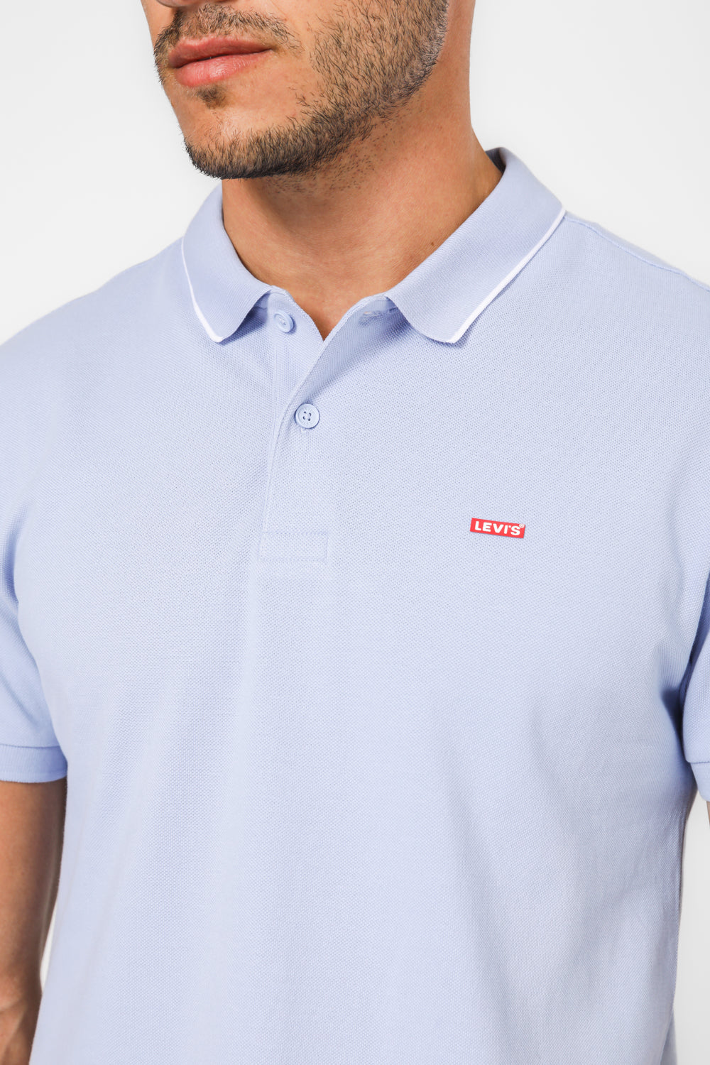 חולצה פולו עם לוגו בצבע תכלת