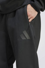 מכנסי טרנינג בצבע שחור | אדידס