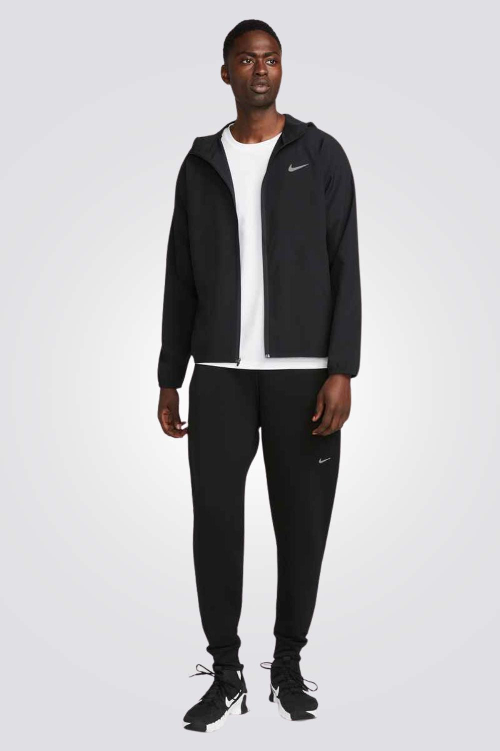 מעיל רב תכליתי עם קפוצ'ון בצבע שחור לגברים | נייקי