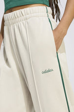 מכנסי טרנינג ארוכים עם גרפיקה רקומה | אדידס