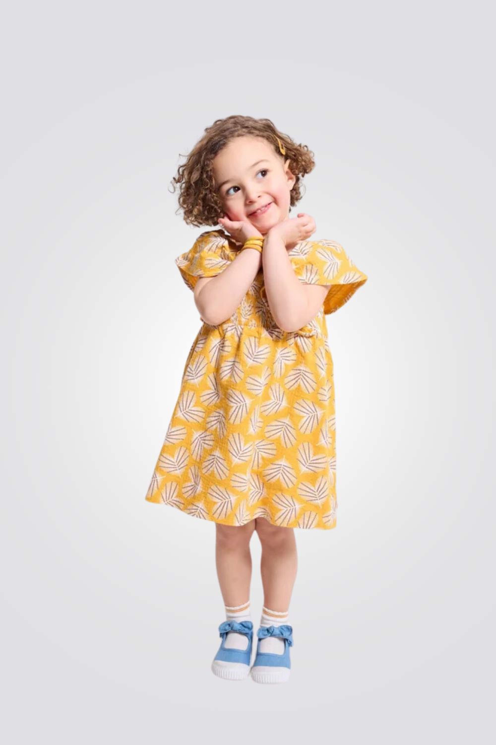שמלה לתינוקות בצבע צהוב עם הדפס עלים