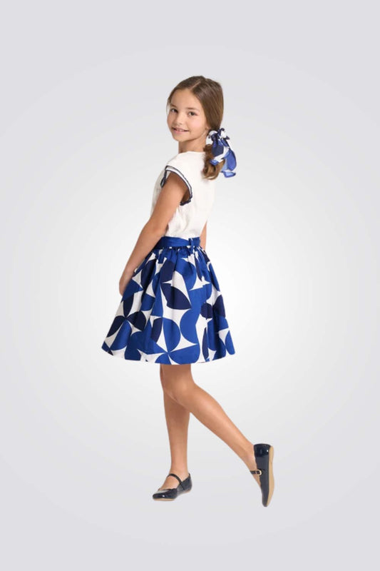 חצאית לילדות בצבע לבן עם פרחים כחולים