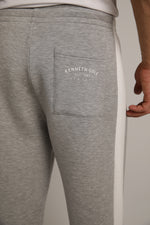 מכנסי טרנינג עם פסי צד | קנת קול