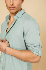 מכותפרת פשתן כיסים מודרן בצבע ירוק