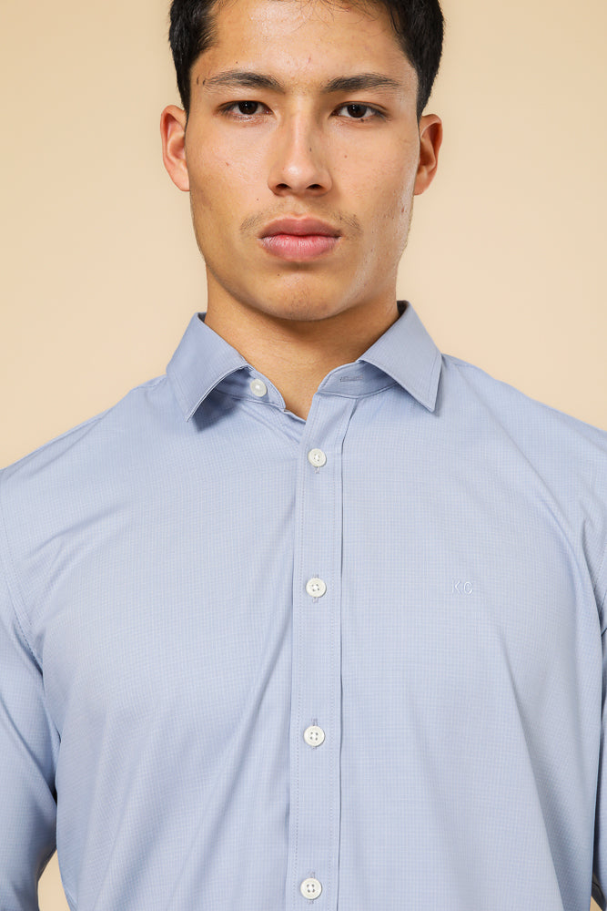 מכופתרת במבוק טקסטורה בצבע כחול