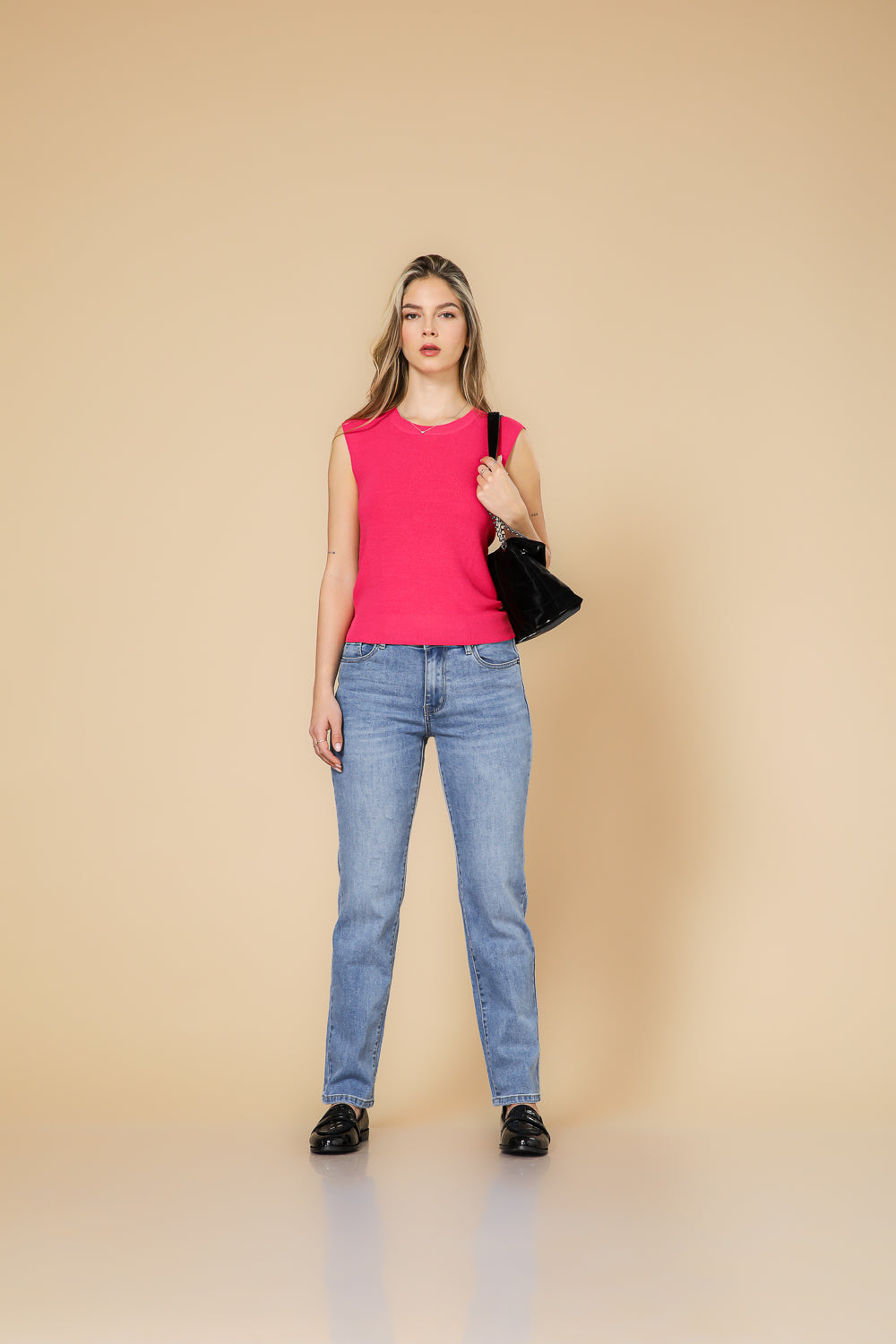 סריג ללא שרוול בצבע ורוד