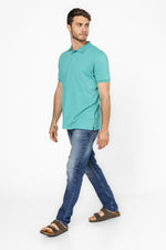 חולצה פולו עם כיס בצבע טורקיז