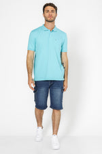 חולצה פולו עם כיס בצבע טורקיז