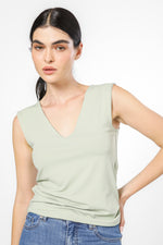 טופ אלסטי מפתח עמוק בצבע ירוק 