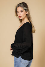 חולצת פליסה שרוול ארוך בצבע שחור