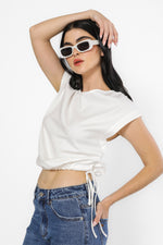 חולצה ללא שרוול בצבע לבן