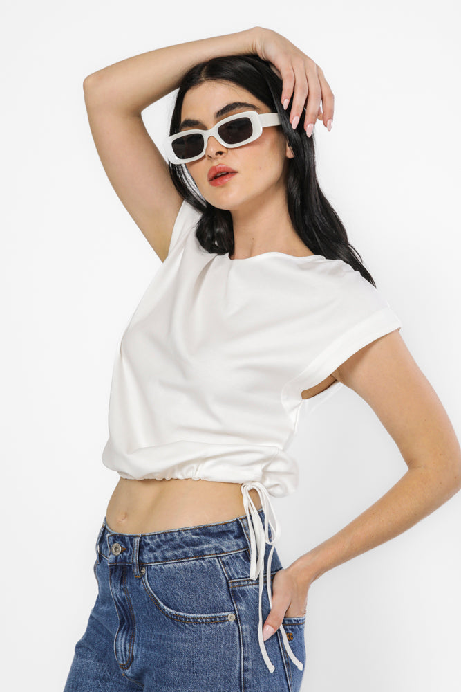 חולצה ללא שרוול בצבע לבן