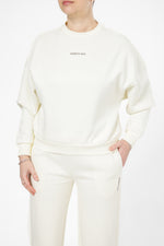 סווטשירט אוברסייז הדפס בגב בצבע קרם