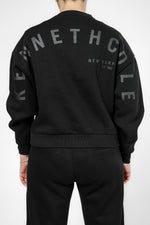 סווטשירט אוברסייז הדפס בגב בצבע שחור