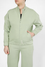 סווטשירט עם רוכסן לוגו בגב בצבע ירוק