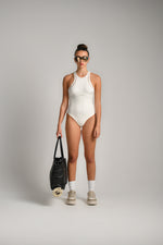 בגד גוף עם חורים סימלס בצבע שמנת