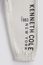 מכנסי ג'וגר ארוכים סיומת אלסטית בצבע אבן