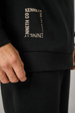 סווטשירט אוברסייז הדפס בגב בצבע שחור