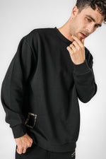 סווטשירט אוברסייז הדפס בגב בצבע שחור