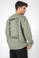 סווטשירט אוברסייז הדפס בגב בצבע זית