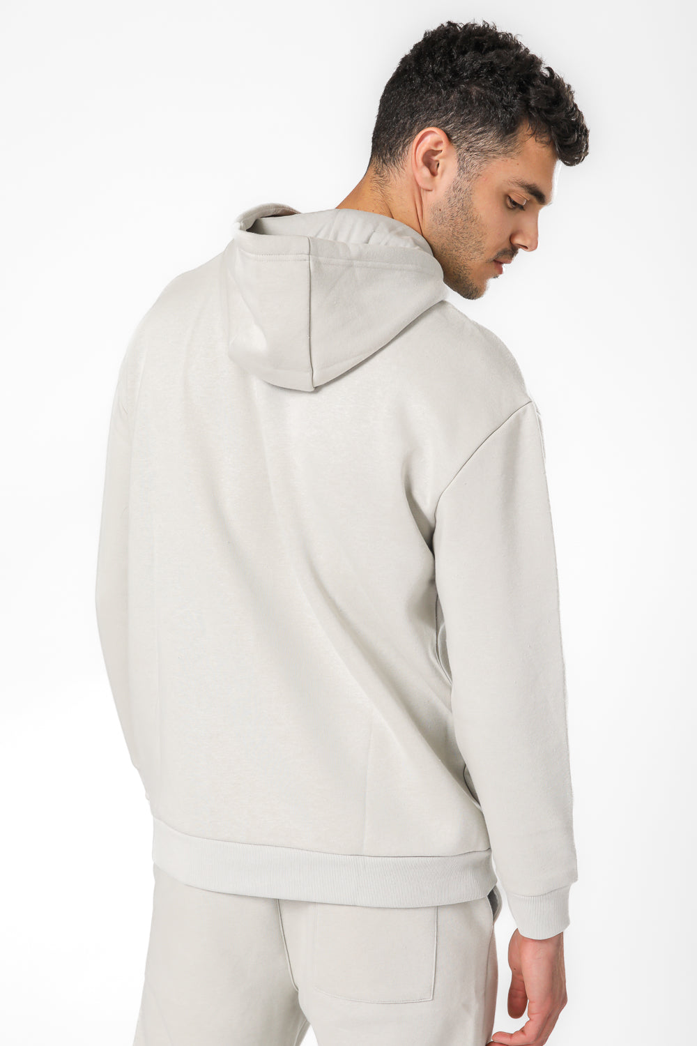 סווטשירט קפוצ'ון אוברסייז עם הדפס בחזית בצבע אבן