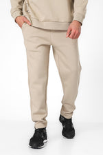 מכנסי טרנינג ארוכים בגזרה ישרה בצבע כאמל