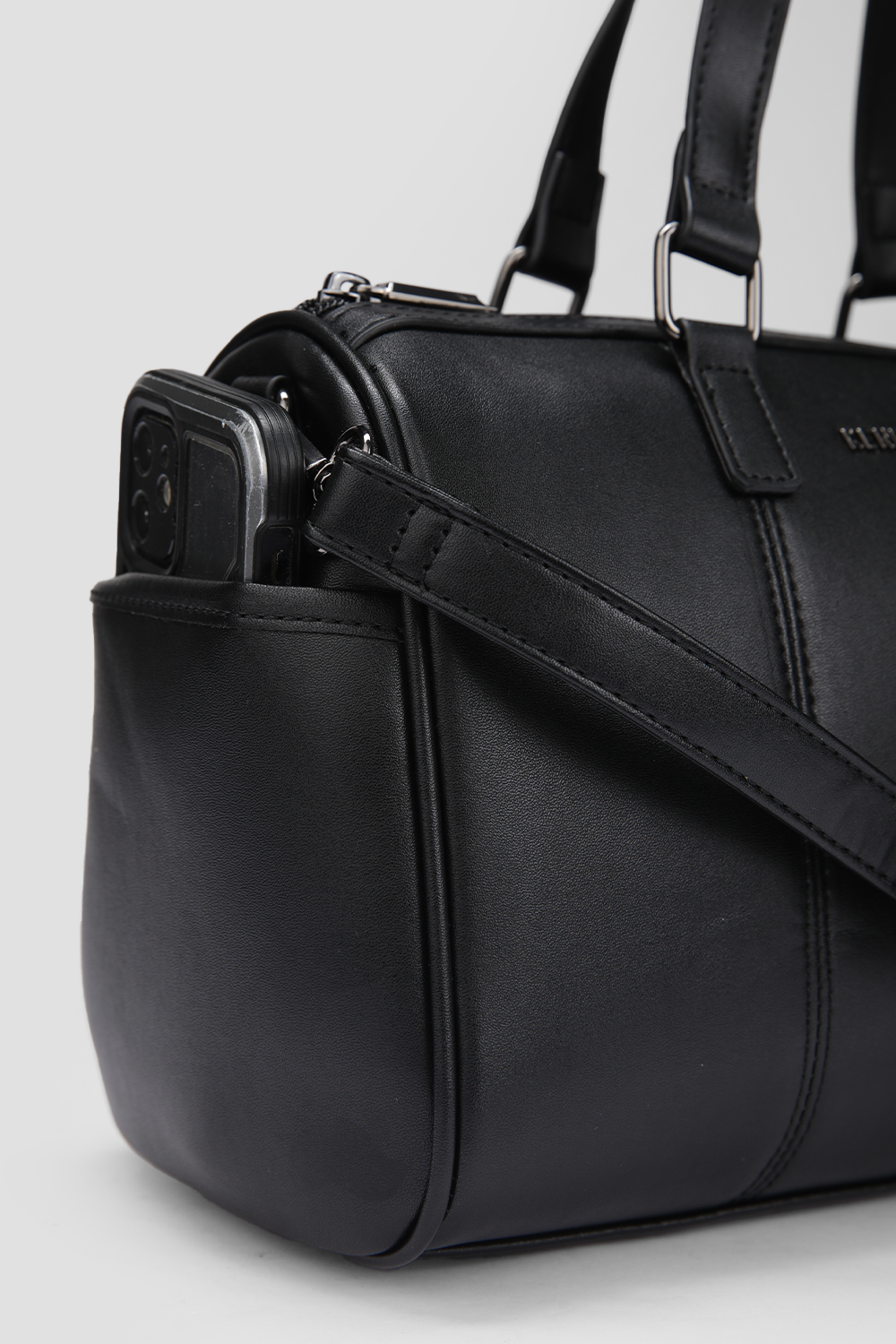 תיק יד דמוי עור בצבע שחור