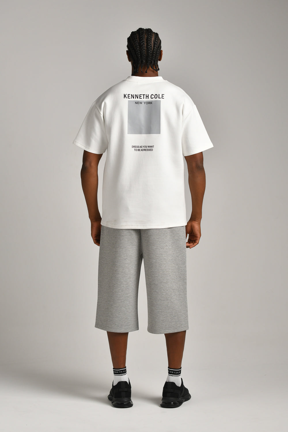 טי שירט אוברסייז עם דפוס בגב