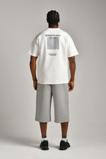 טי שירט אוברסייז עם דפוס בגב