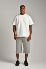 טי שירט אוברסייז עם דפוס בגב