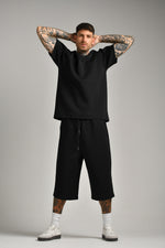 טי שירט אוברסייז עם דפוס בגב