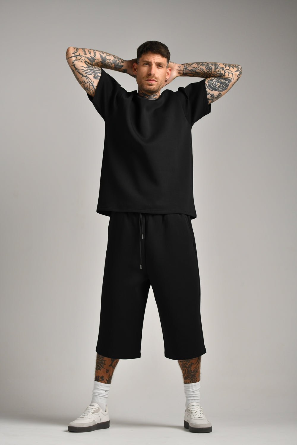 טי שירט אוברסייז עם דפוס בגב