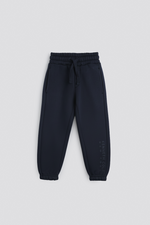 מכנסי טרנינג עם לוגו ברגל | קנת קול