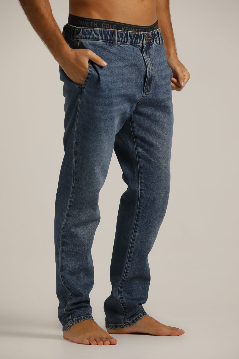 מכנסי ג'ינס במראה שטוף ובגזרת סלים | קנת קול