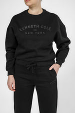 סווטשירט אוברסייז סיומת אלסטית בצבע שחור