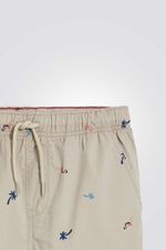 מכנסי ברמודה לילדים בצבע בז' עם הדפס עצים