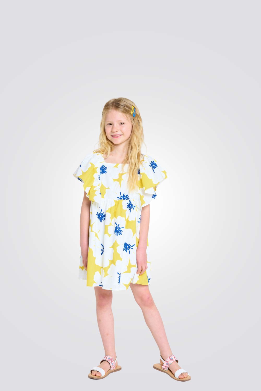 שמלה לילדות בצבע צהוב עם הדפס פרחים 