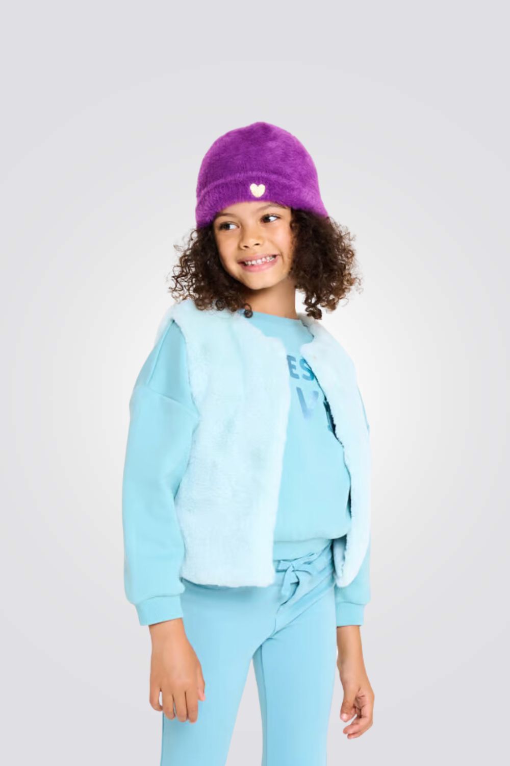 ווסט דמוי פרווה בצבע תכלת לילדות