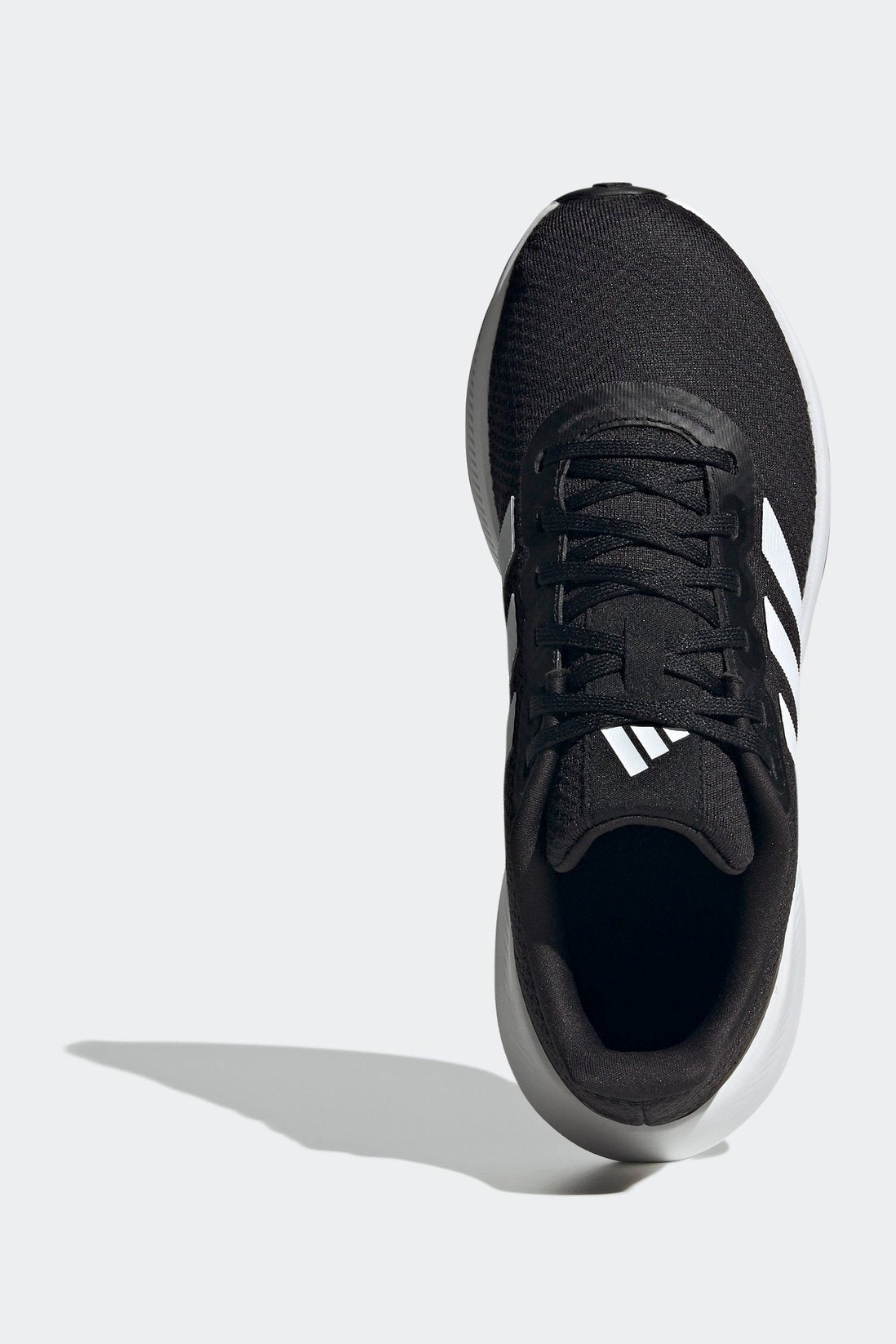 נעלי ספורט לנשים RUNFALCON WIDE 3 בצבע שחור ולבן