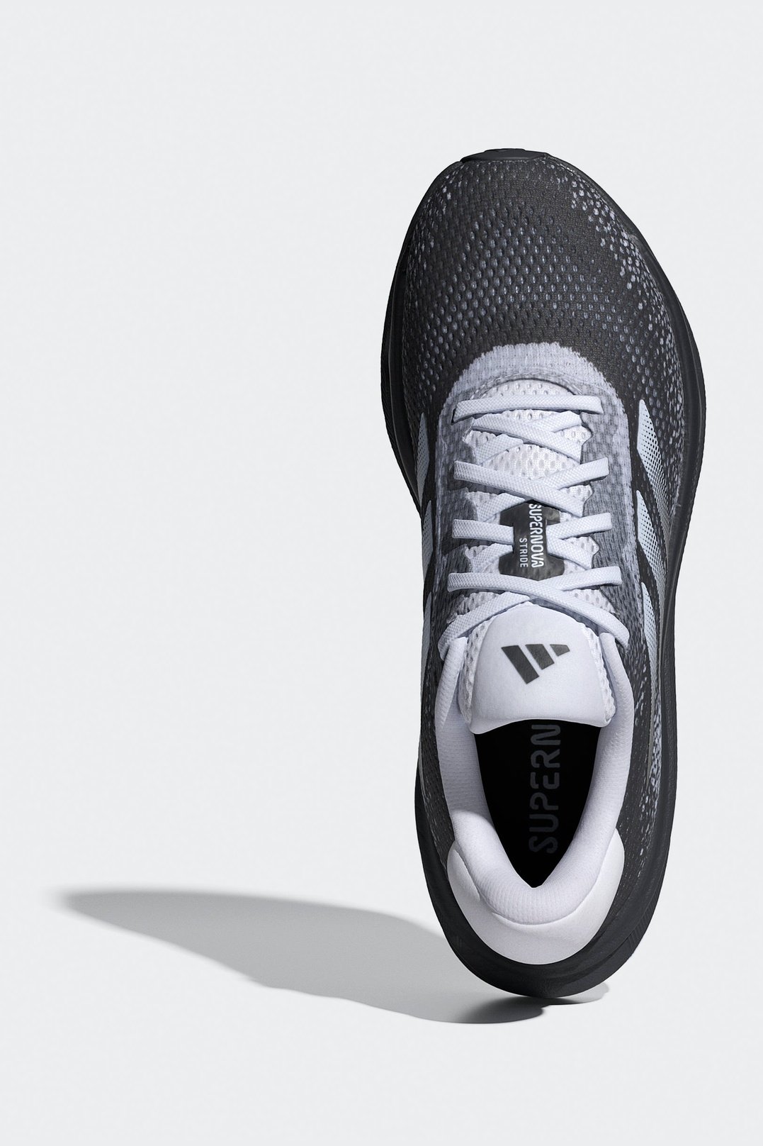 נעלי ספורט לנשים SUPERNOVA STRIDE בצבע לבן ושחור