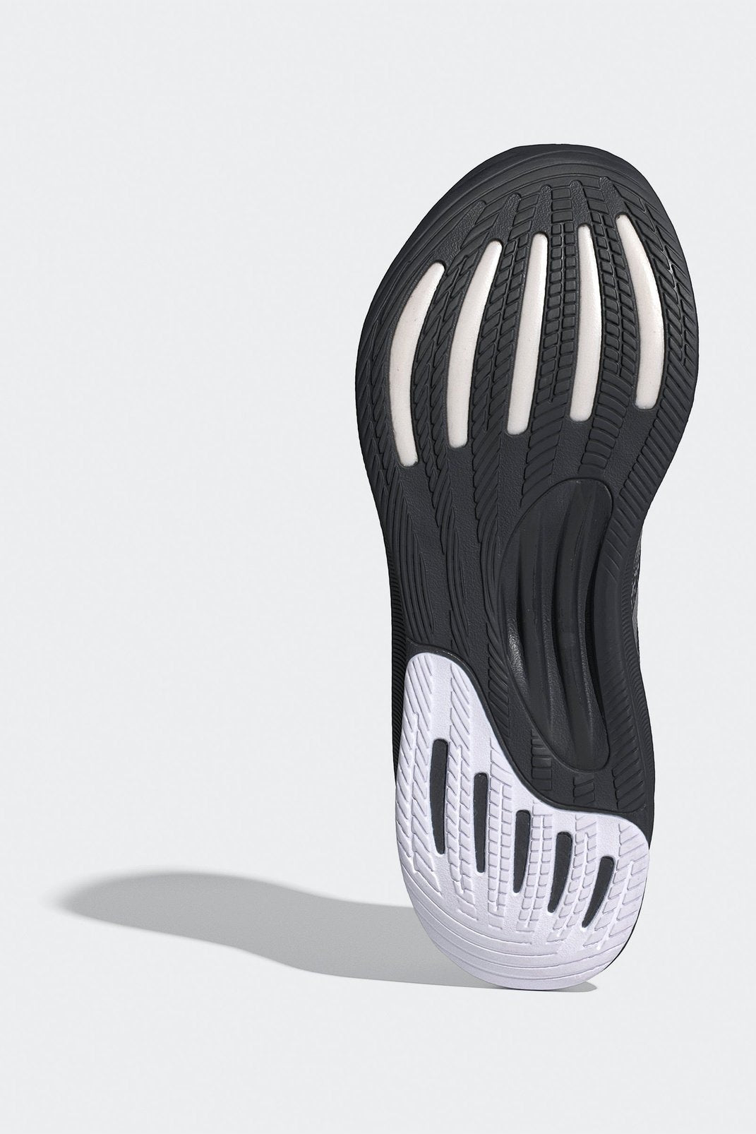 נעלי ספורט לנשים SUPERNOVA STRIDE בצבע לבן ושחור