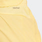 מכנסיים קצרים לנשים TRAIN ESSENTIALS WOVEN בצבע צהוב - 5