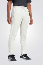 מכנסיים ארוכים HOUSE OF TIRO בצבע שמנת