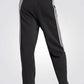 מכנסיים ארוכים לנשים FUTURE ICONS 3-STRIPES OPEN HEM בצבע שחור - 2