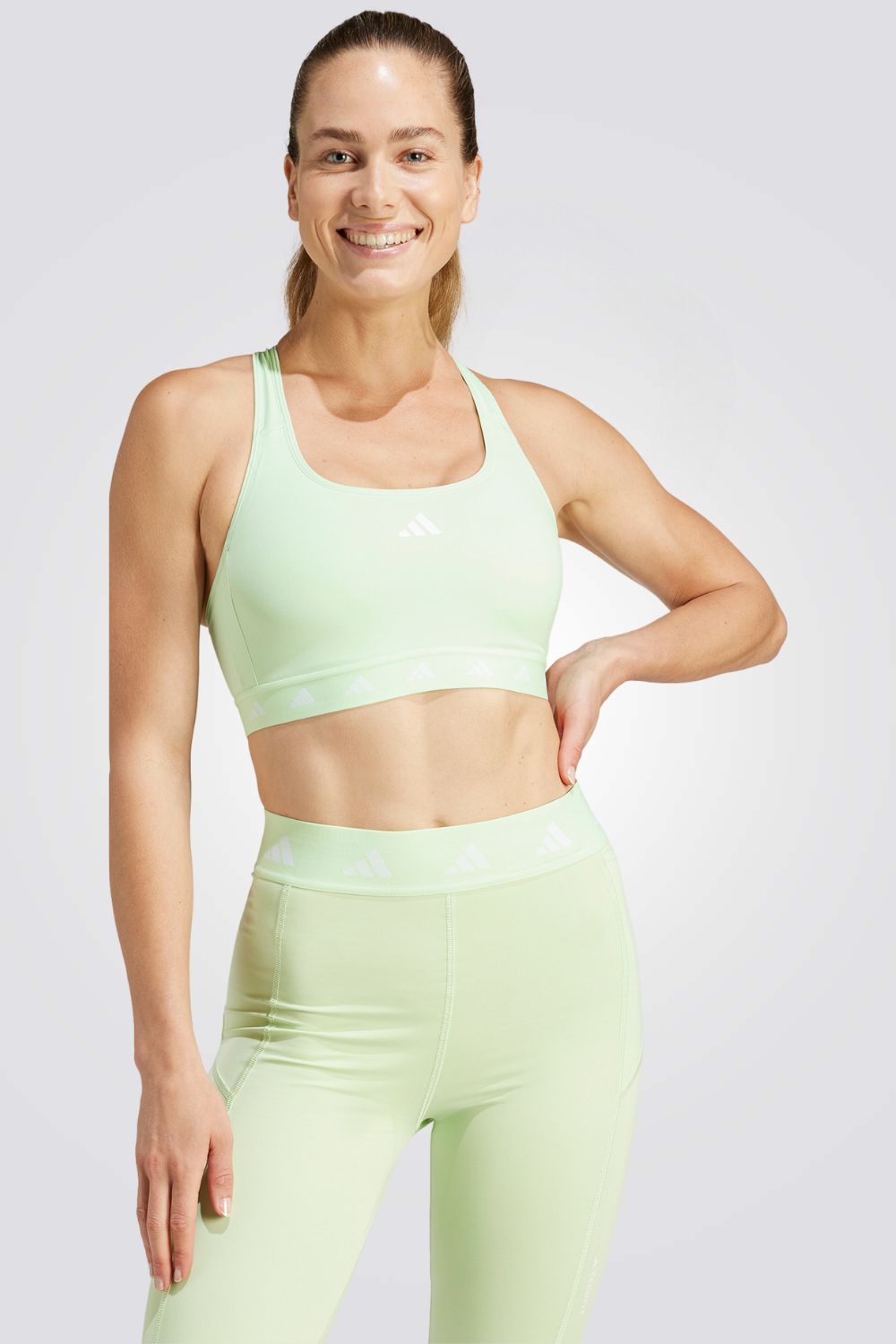 טופ לנשים  POWERREACT TRAINING MEDIUM-SUPPORT TECHFIT בצבע ירוק זוהר