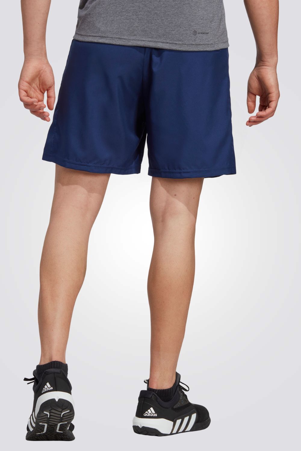 מכנסיים קצרים לגברים TRAIN ESSENTIALS WOVEN בצבע נייבי ולבן