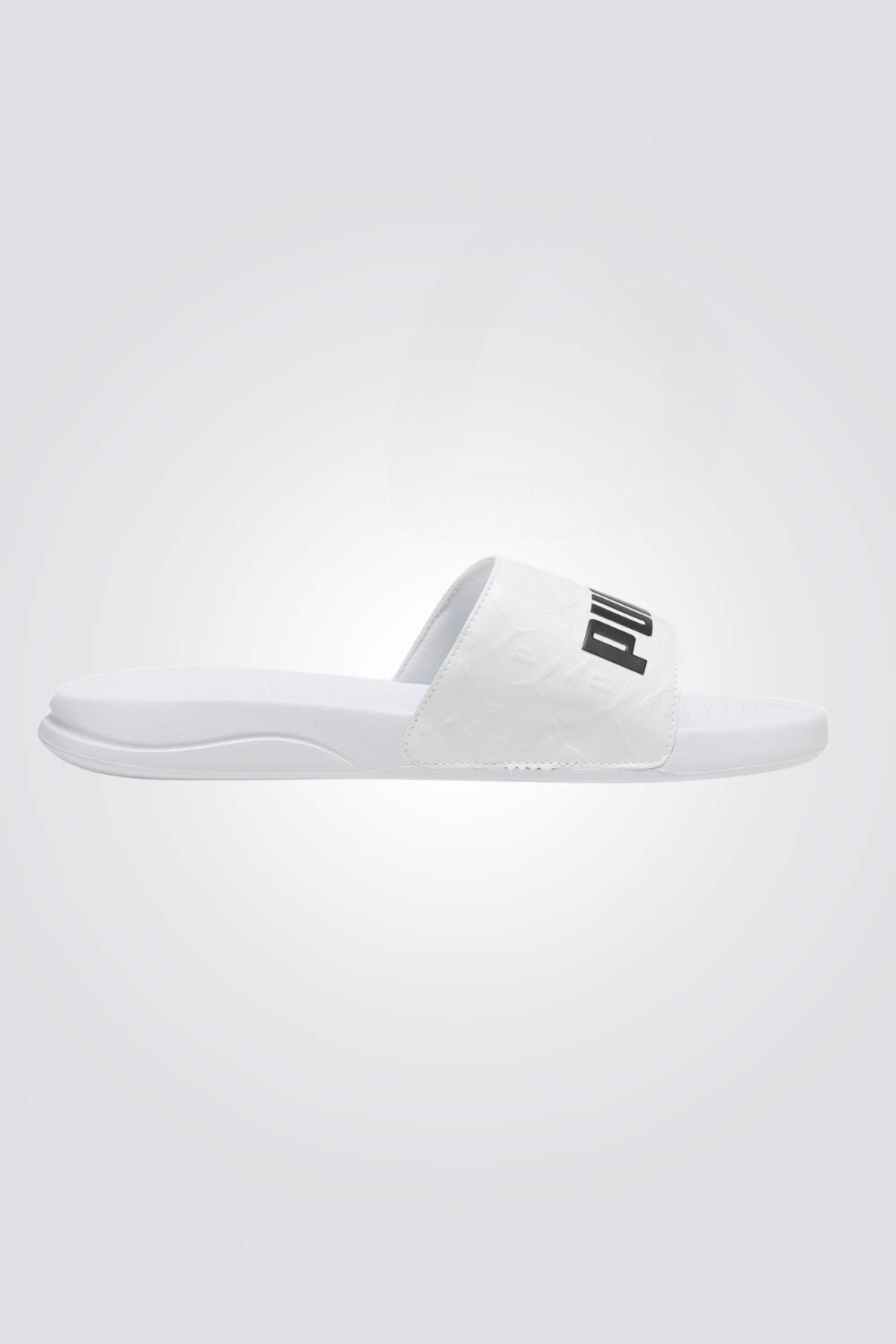 כפכפים מבית המותג PUMA בעלות מדרס פנימי, לתמיכה מלאה ברגל. סולייה חיצונית מגומי, שמספקת אחיזה מלאה בקרקע.